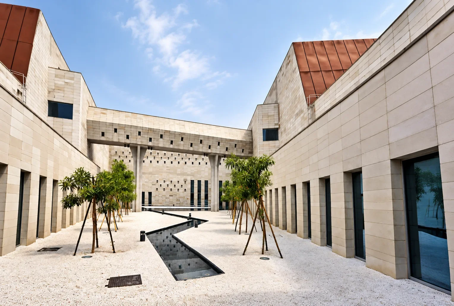 Open-to-sky courtyard at Bihar Museum Patna linking steel-clad galleries